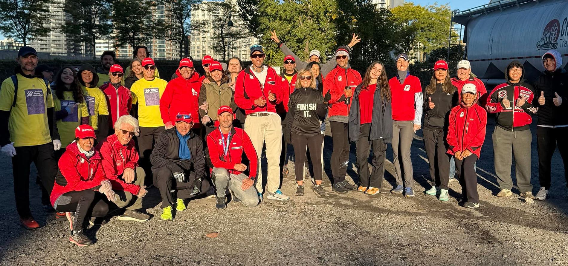 About forty Boreal club members, in red, gathered at sunrise.